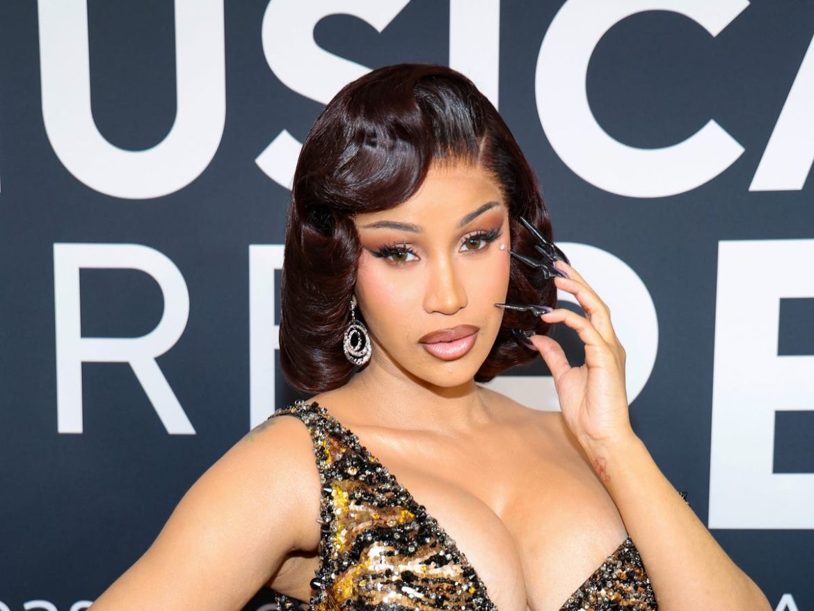 Cardi B Brings Feathers, Sequins, and Drama to the 2025 Grammys Cardi B