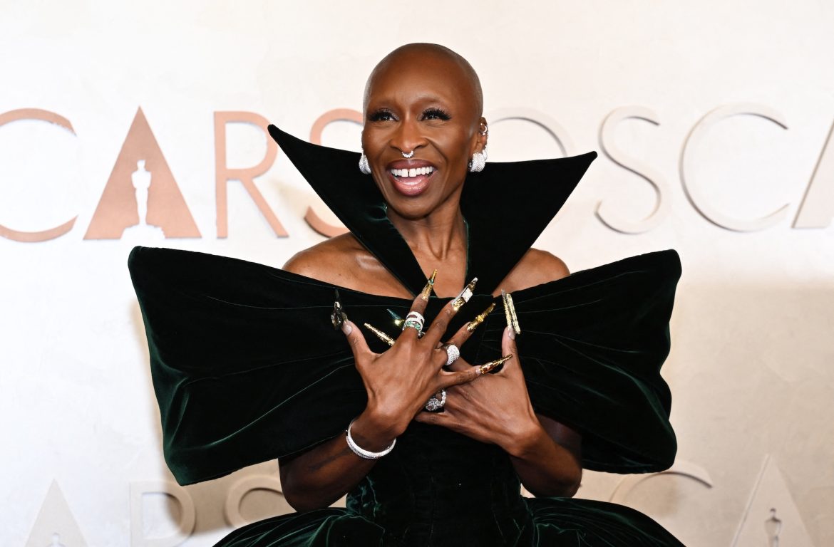 Cynthia Erivo Pays Homage to Hattie McDaniel at the 2025 Oscars in a Dramatic Louis Vuitton Gown & 5-Hour Gold Nails Cynthia Erivo attends the 97th Annual Academy Awards at the Dolby Theatre in Hollywood, California on March 2, 2025.