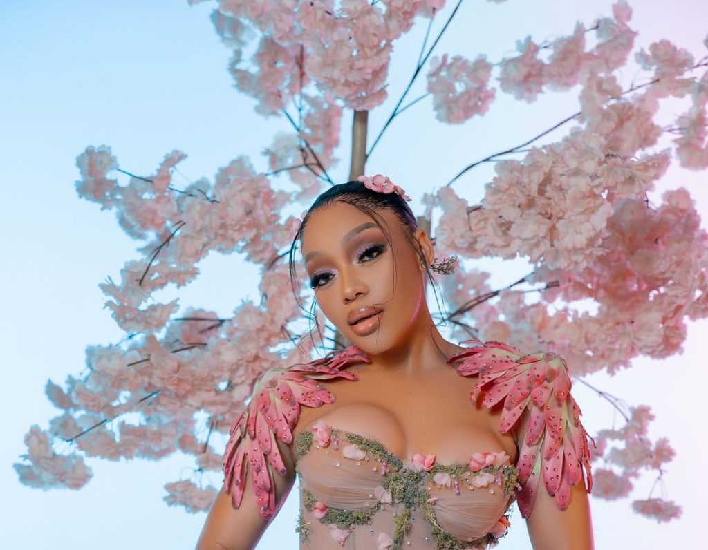 Thando Thabethe’s jaw-dropping moss-and-blossom gown at Durban July 2025