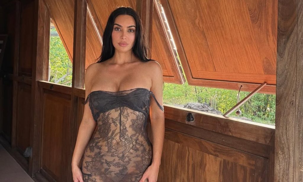 Kim Kardashian Redefines Naked Dressing in a Sheer Lace Fantasy by the Sea
