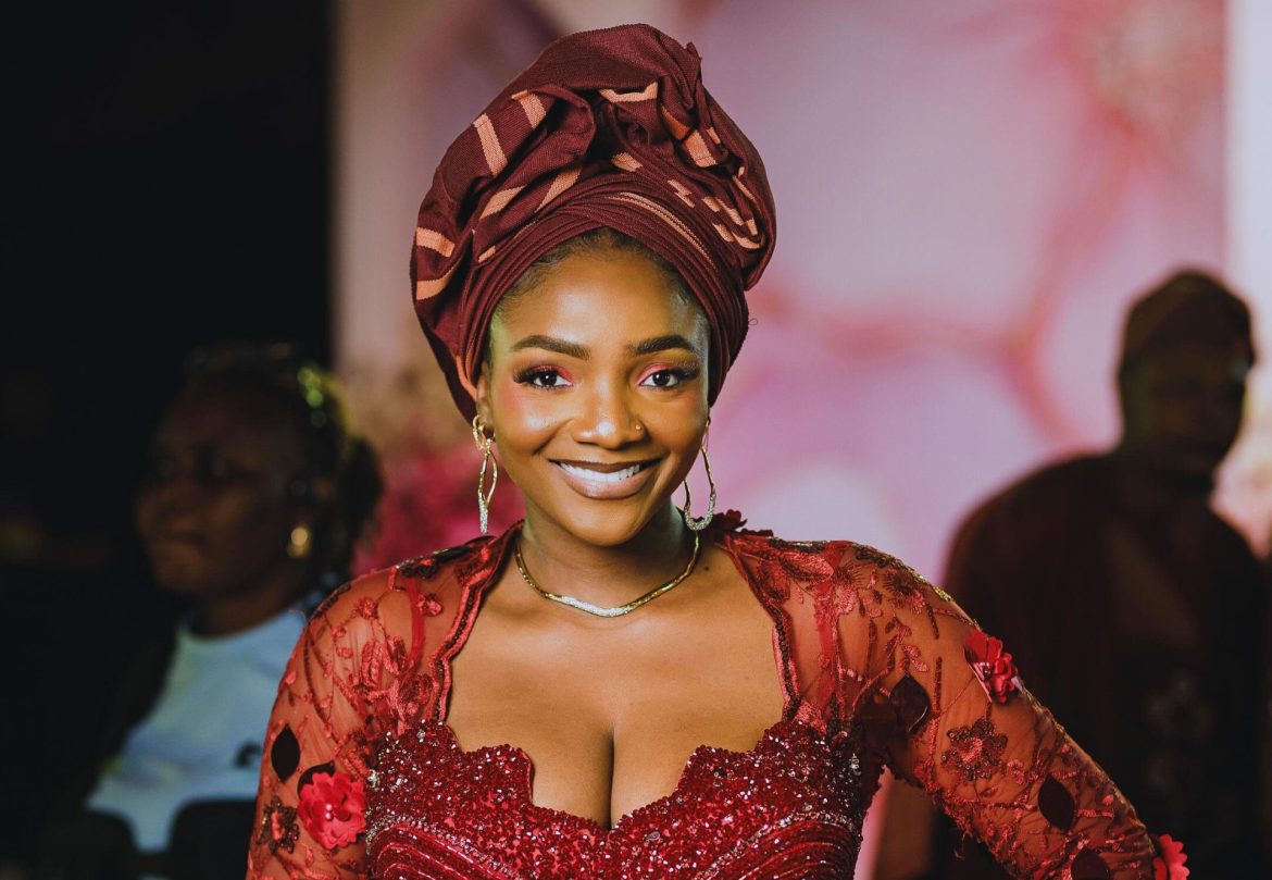 Simi Slays in Burgundy Corset Look for Mother’s 70th Birthday