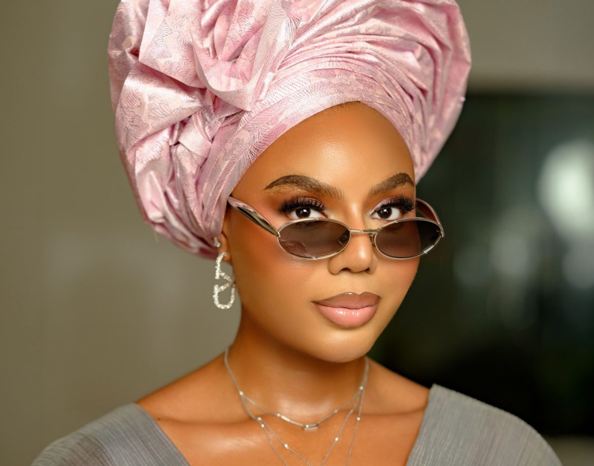 Nancy Isime Turned Heads in a Striking Liquid-Silver Look Paired with Blush Pink Gele
