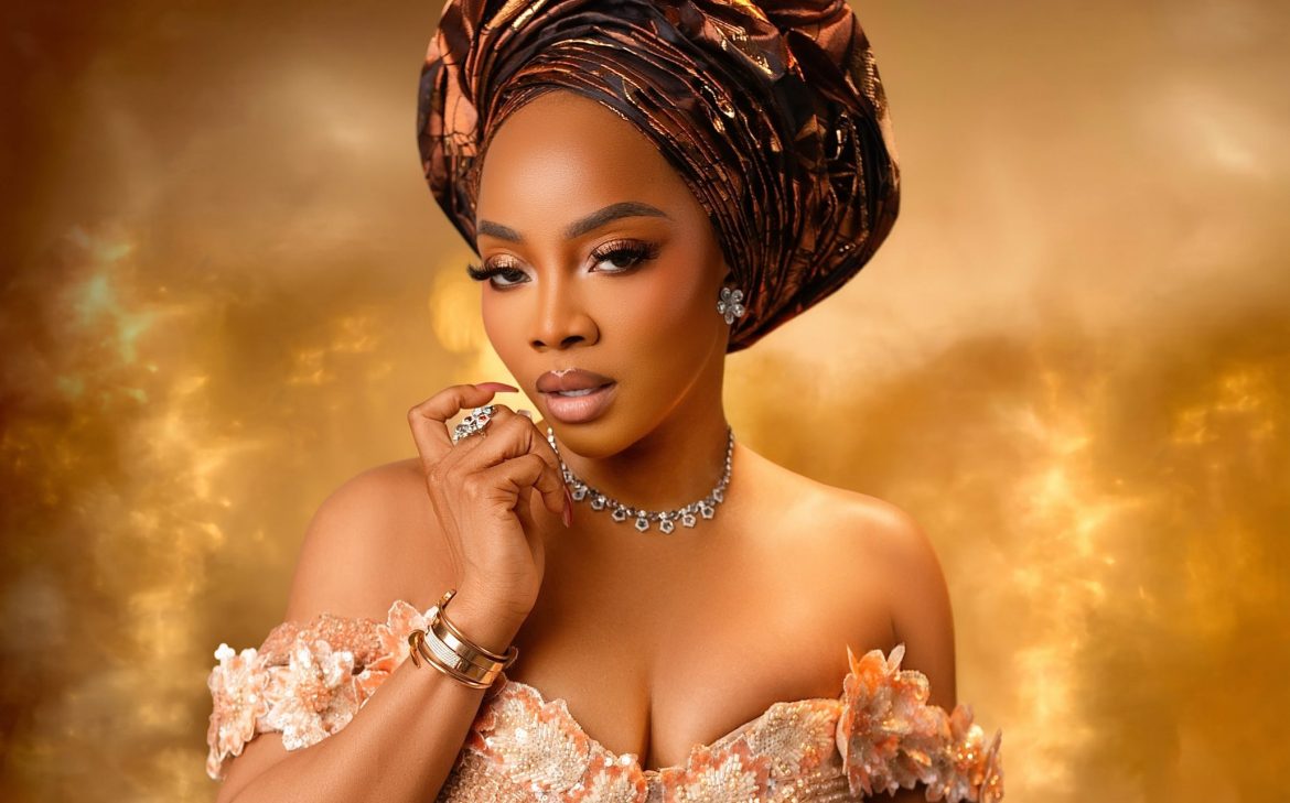 Toke Makinwa Stuns in Peach and Bronze Wedding Guest Look