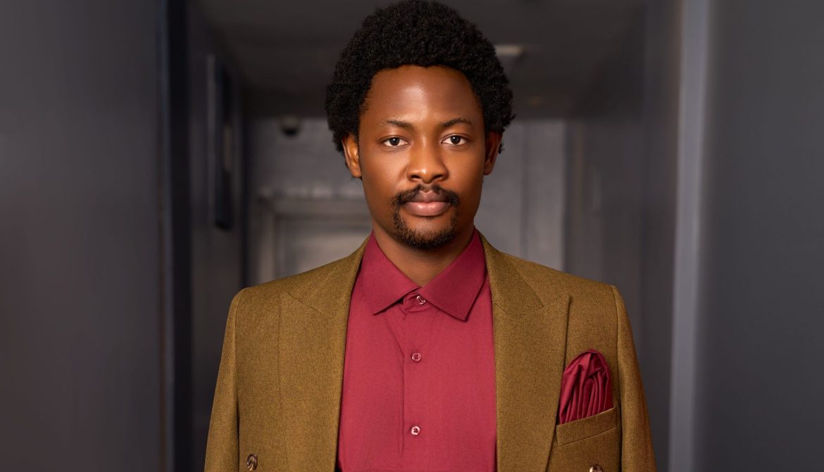 Aikou Ajanaku Pairs Olive Gold and Wine in a Standout Suit Look Aikou