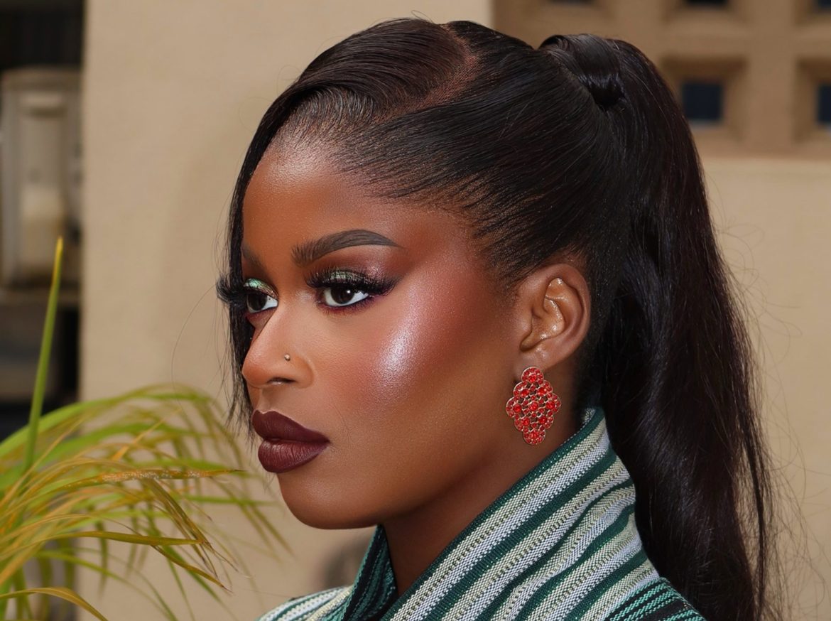 Temi Nkem Gives Larabela’s Green Aso-Oke a Red-Hot Twist